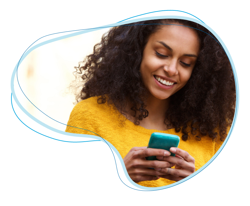 happy woman looking at her phone
